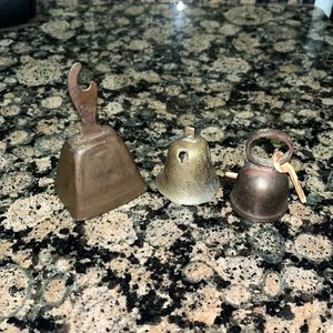 Three small brass bells